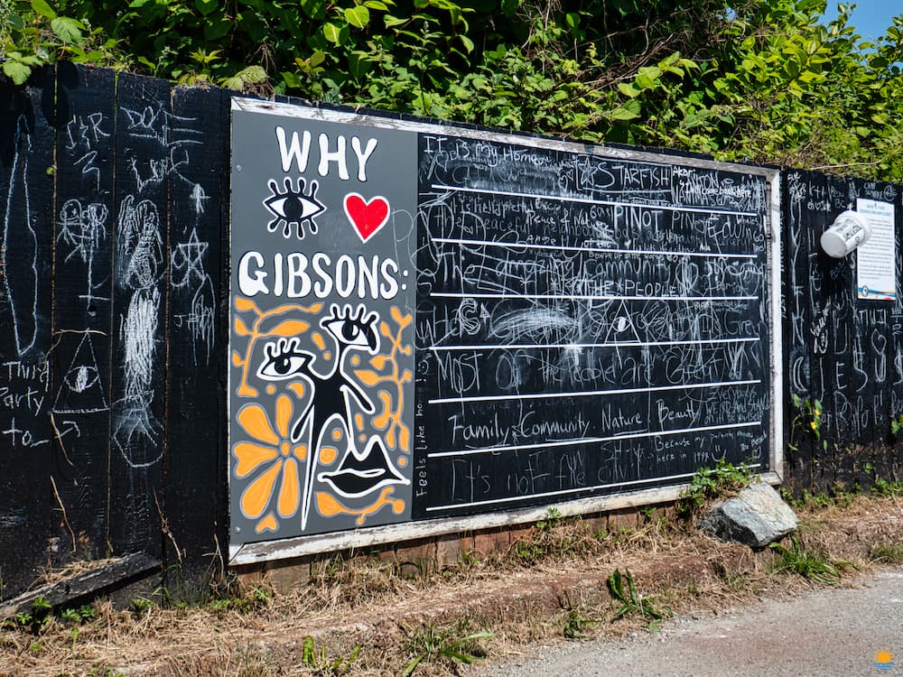 A chalkboard set up along the seawalk in Gibsons where passersby can write what they love about this small town on BC's Sunshine Coast.